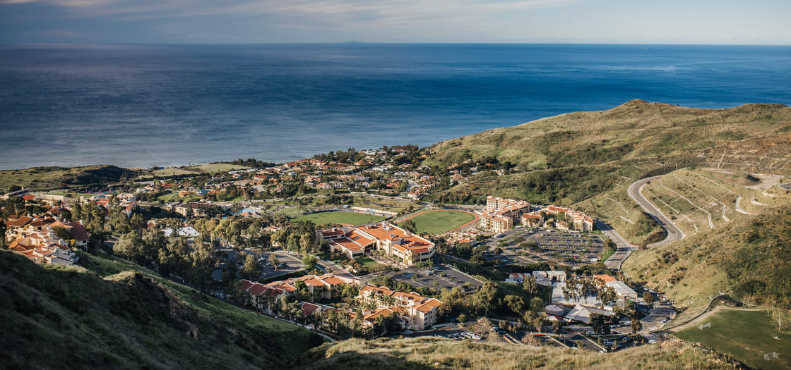 a view of the Pepperdine campus in the foreground and the ocean in the background