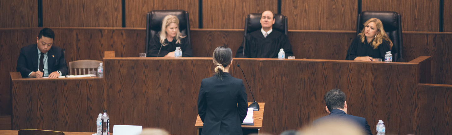 Student presents case to judges at a Pepperdine Caruso Law Moot Court competition
