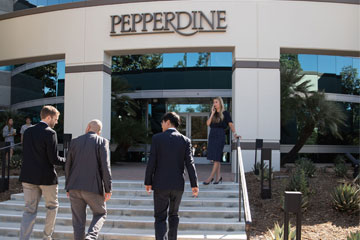 four young professionals outside of the Pepperdine Calabasas campus