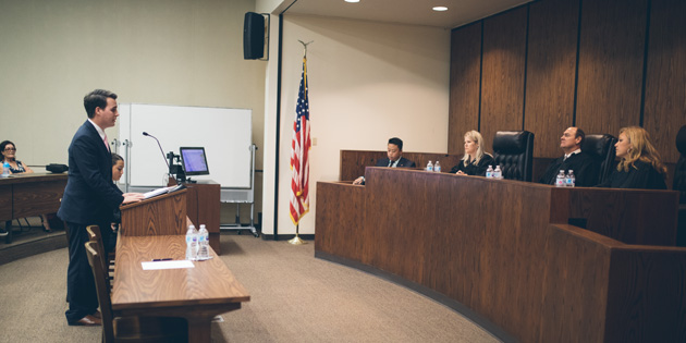 student jacob martin arguing his case at a moot court competition