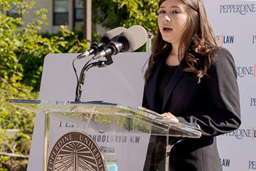 Law student Carmen Oliva speaking at the Caruso dedication ceremony
