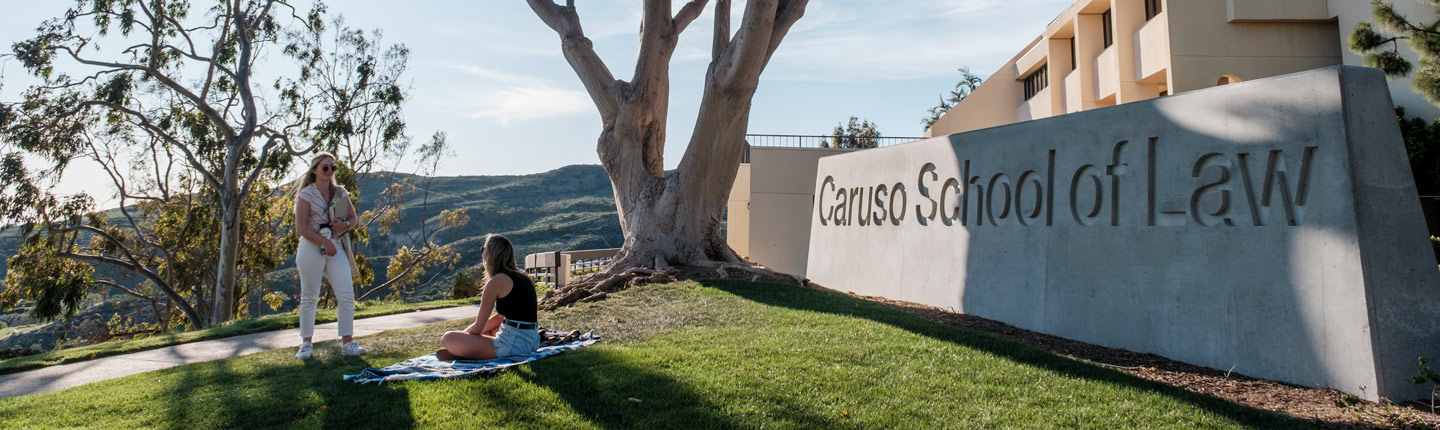 Caruso School of Law sign and building 