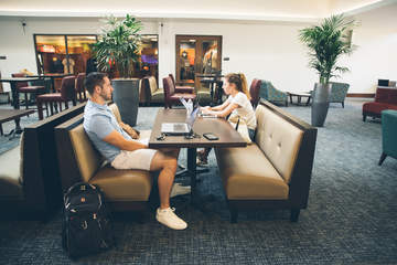 students studying together in atrium