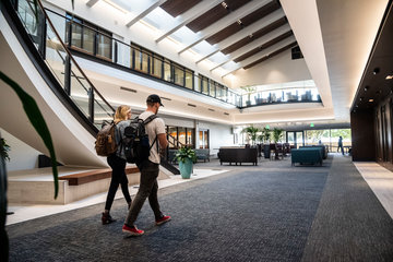 students walking inside the law school campus