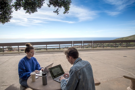 two pepperdine international students studying on malibu campus