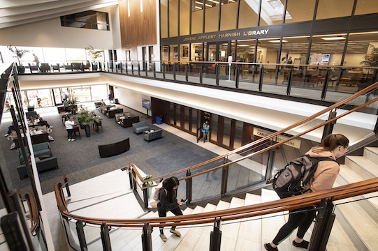 pepperdine law students walking upstairs to library