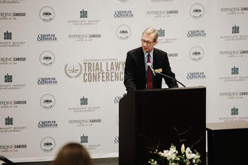 Dean Paul Caron speaking at a conference