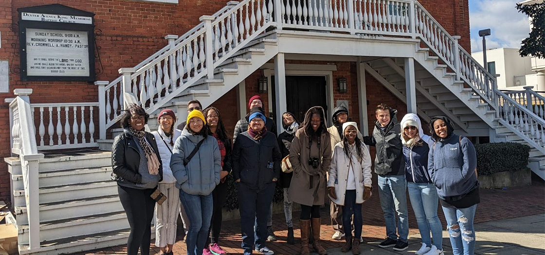 2022 Faith and Justice Trip in front of the Dexter Avenue King Memorial Baptist Church