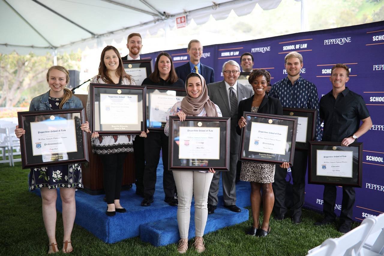 Parris Award Recipients pictured with Dean Caron on the school of law front lawn