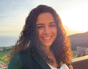 rotem photographed on the school of law terrace at sunset