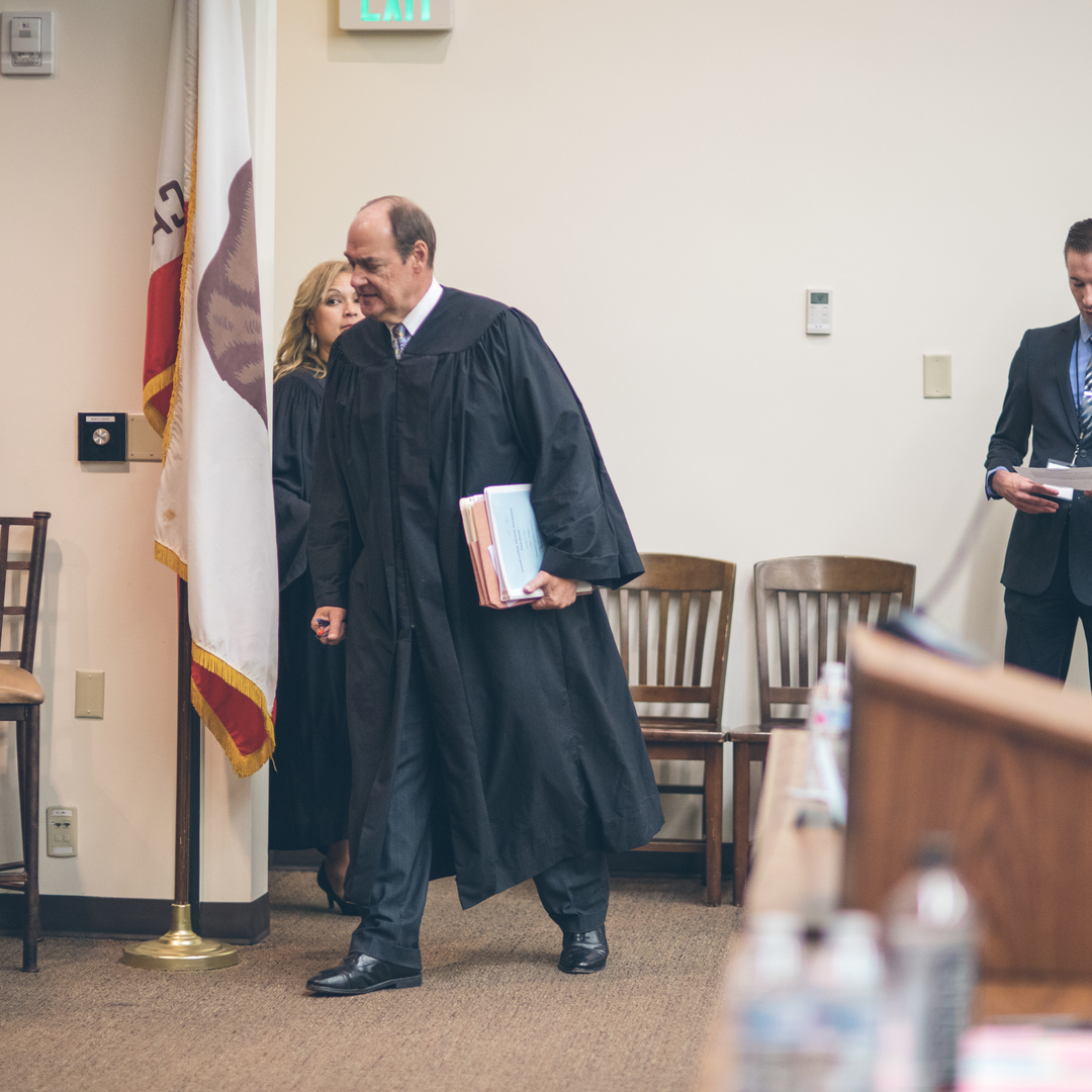 Judge enters the Appellate Courtroom at Caruso Law