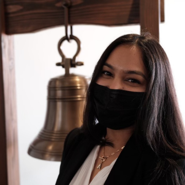 Alina Ahmed with jobs bell