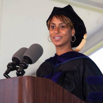 Angela Powell at commencement stage podium