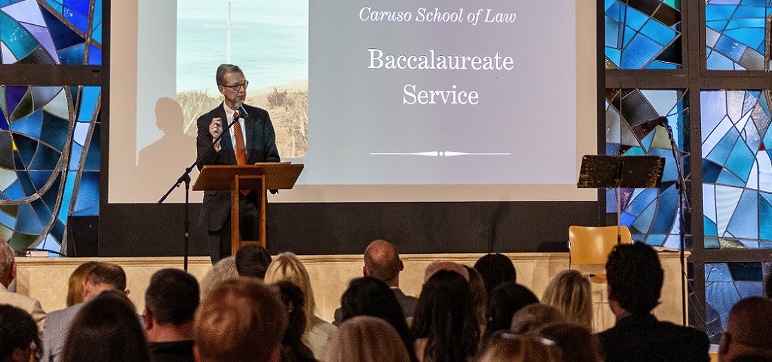Dean Paul Caron speaking at baccalaureate 2023