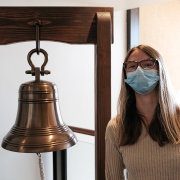 Cara MacDonald with jobs bell