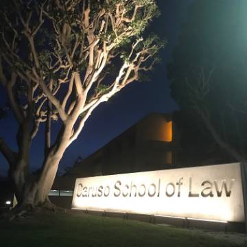 Caruso Law at night