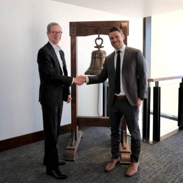 Clayton Collier with jobs bell