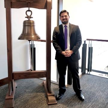 David Portillo with jobs bell