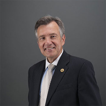 Douglas Kmiec in a suit