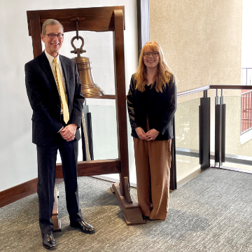 Emily Brooks with jobs bell