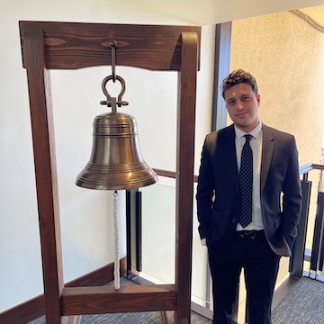 Fabi Behnam with jobs bell