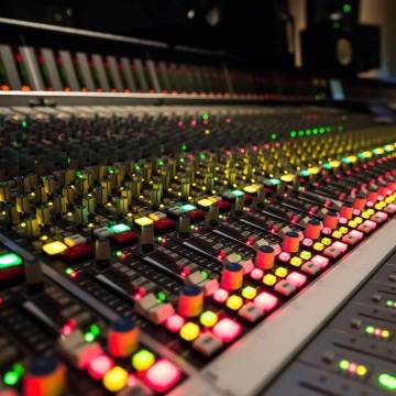 Photo of music mixing board console