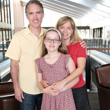 Nancy Hunt with her daughter and husband