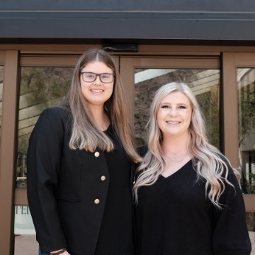 Nicole Geiser and Tatum Lowe at Caruso Law entrance