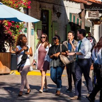 Group of online residency students walking