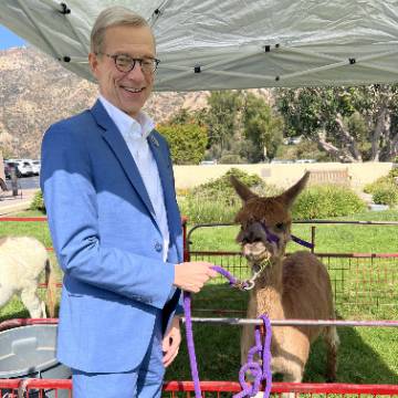 Paul Caron with alpaca
