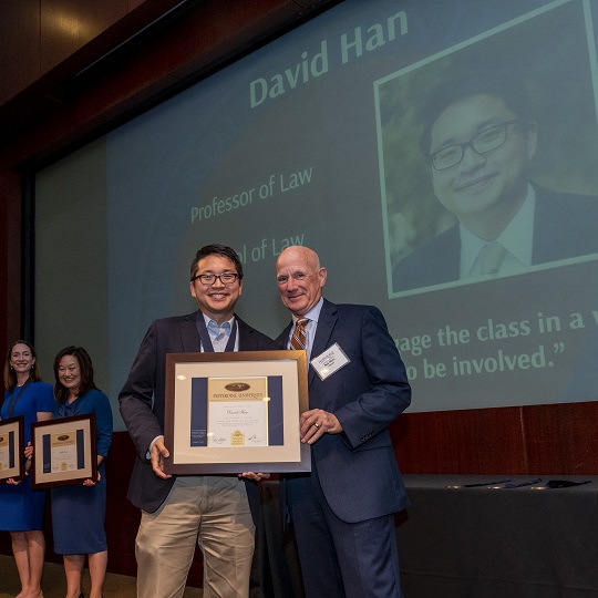 David Han receiving plaque award