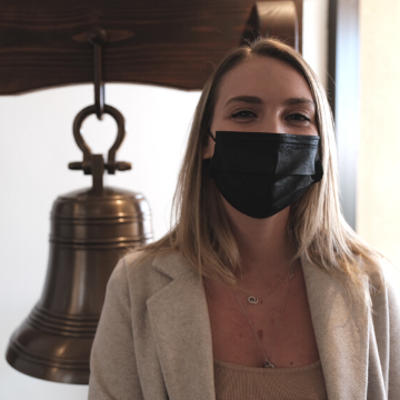 Samantha Mills with jobs bell